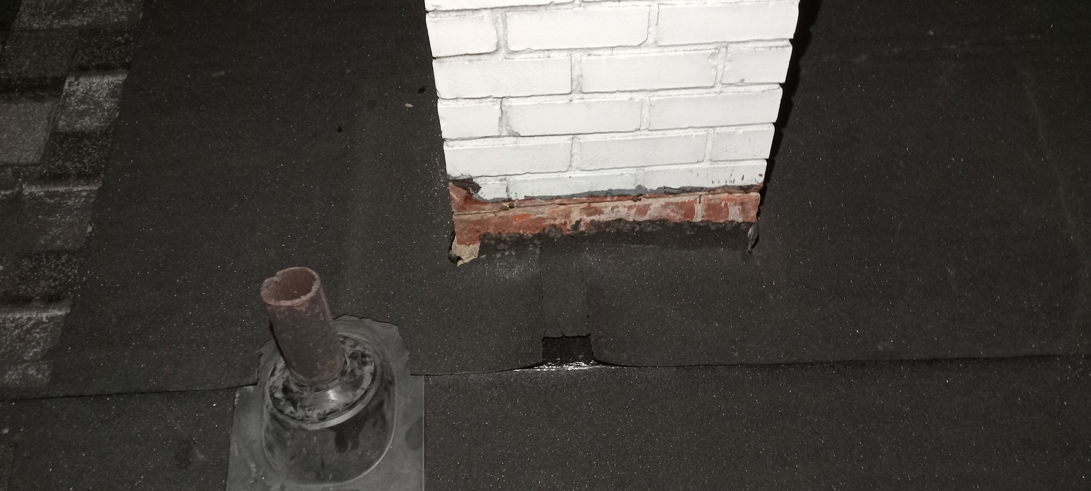 Roof membrane around a chimney repair opening